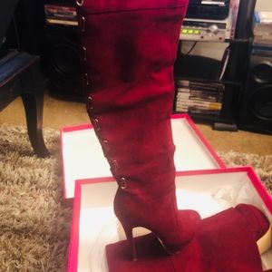 Thigh high heeled boots